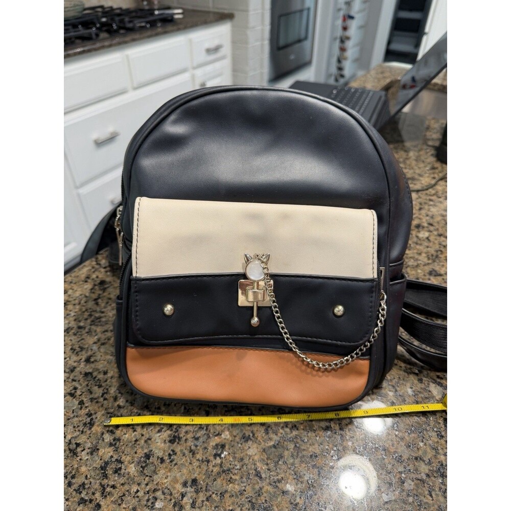 Biaggi Faux Leather Tri-Color Mini Backpack Purse - Cat Clasp Detail